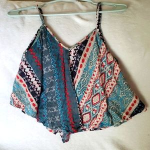 Multi color crop top with inside sewn bra. This is a size large, made by Angie.